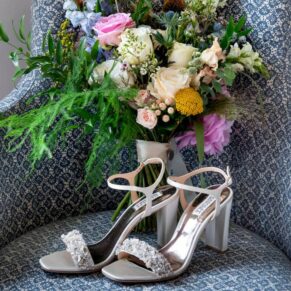 Swan at Streatley wedding - the bride's colourful shoes and bouquet pre ceremony