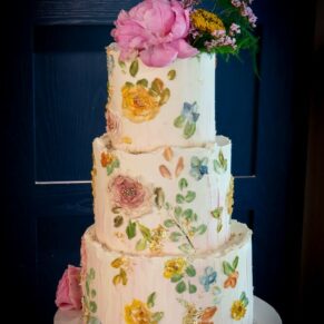 The Swan at Streatley Hotel photography of a very colourful wedding cake 
