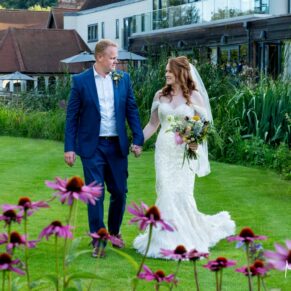 The Swan at Streatley - the newlyweds take a stroll in the colourful gardens of the hotel 