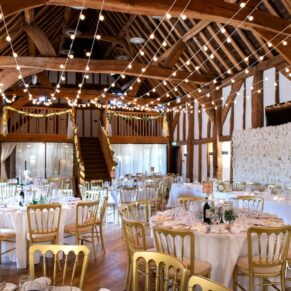 The grand Tudor Barn interior all set for the wedding breakfast