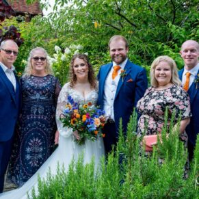 The Olde Bell Hurley Wedding Photography - the newlyweds with their parents in the lovely gardens of the hotel