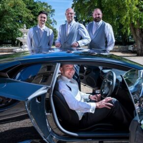 The groom sat in his glitzy sports car with his three ushers watching over at Weston Manor Hotel
