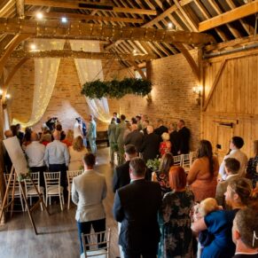 The barn ceremony in full swing for this summer wedding