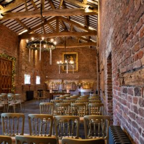 Interior photography of the historic barn interior at this majestic Buckinghamshire wedding venue 