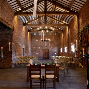 Striking interior photography of the rustic barn wedding venue interior at this historic Buckinghamshire venue setting 