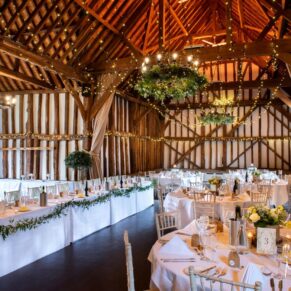 Interior photography of the striking barn interior at this Buckinghamshire venue just prior to the wedding breakfast