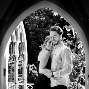 Very relaxed couple portraits photography captured in a feature window in Buckinghamshire 