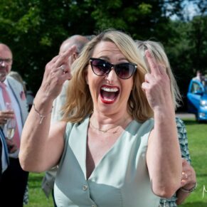 Photography of a guest who was not shy at this Buckinghamshire pub wedding 