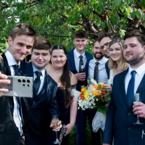 Selfie photography time during the drinks reception for these guests at this Buckinghamshire pub wedding 