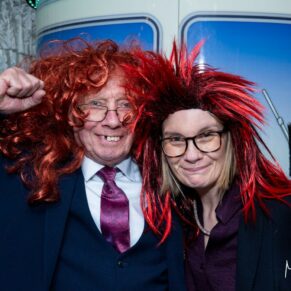 Winters Tale Country Barn wedding photography of guests enjoying the party vibes in the photo-booth