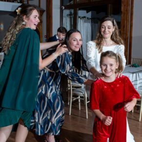 Winters Tale Country Barn wedding photography of the fun loving guests enjoying the party vibes on the dancefloor in the conga line